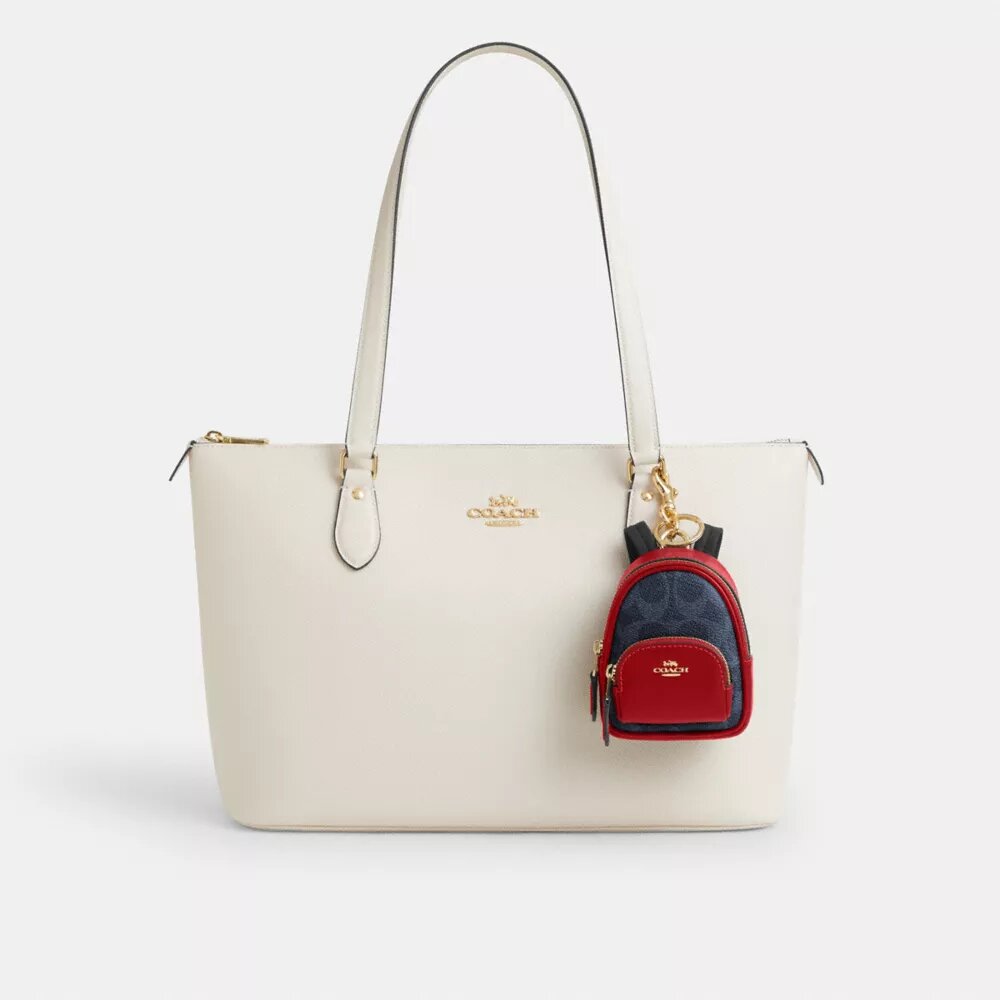 Mini Court Backpack-taskevedhæng i Signature Canvas