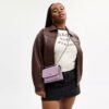 Mini Klare Crossbody-taske i signaturlæder