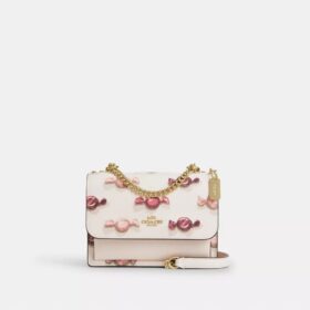 Mini Klare crossbody-taske med slik-print