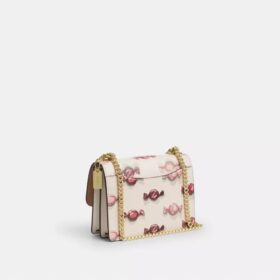 Mini Klare crossbody-taske med slik-print