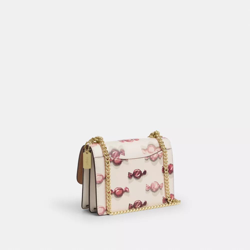 Mini Klare crossbody-taske med slik-print