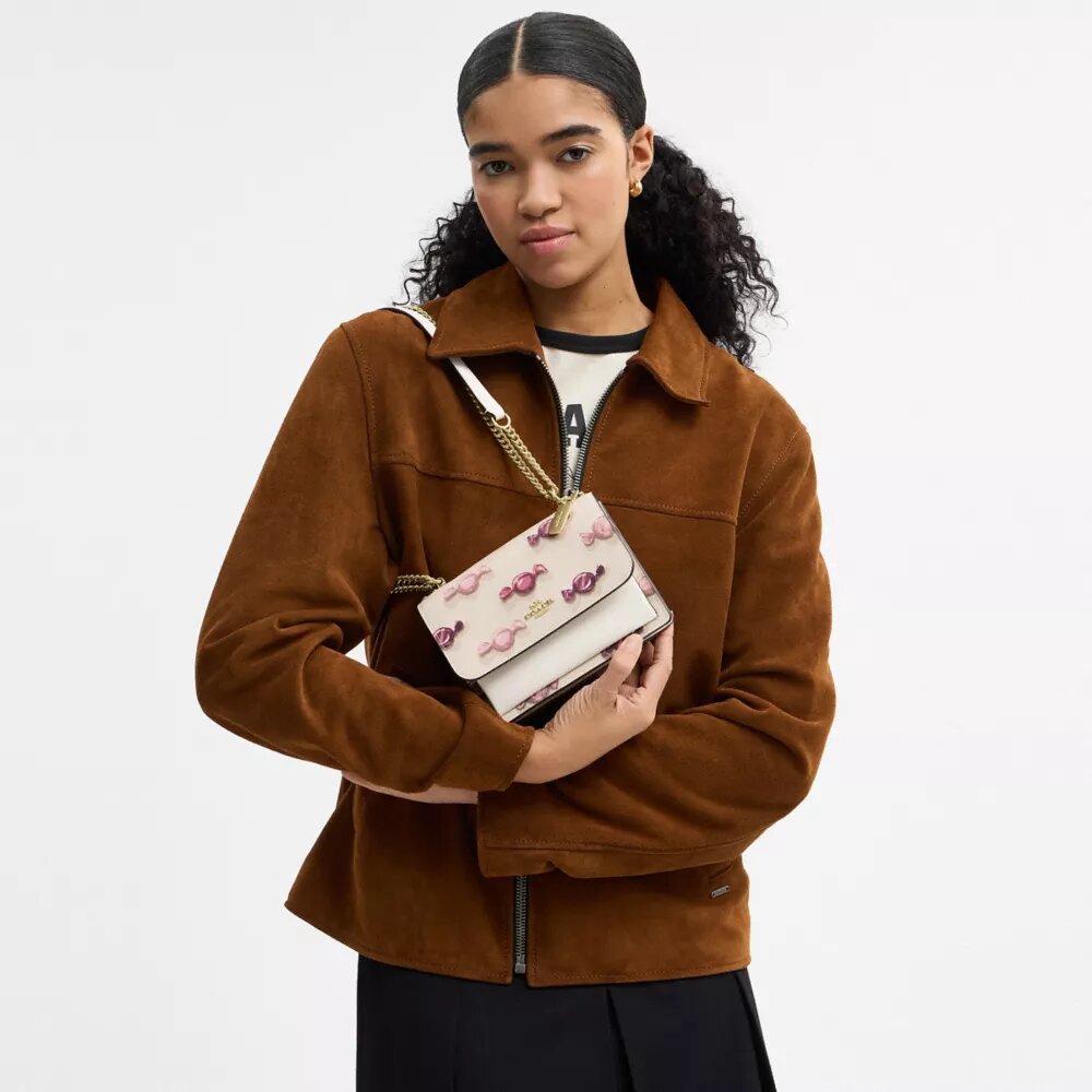Mini Klare crossbody-taske med slik-print