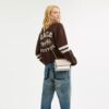 Mini Klare crossbody-tasker i Signature Canvas