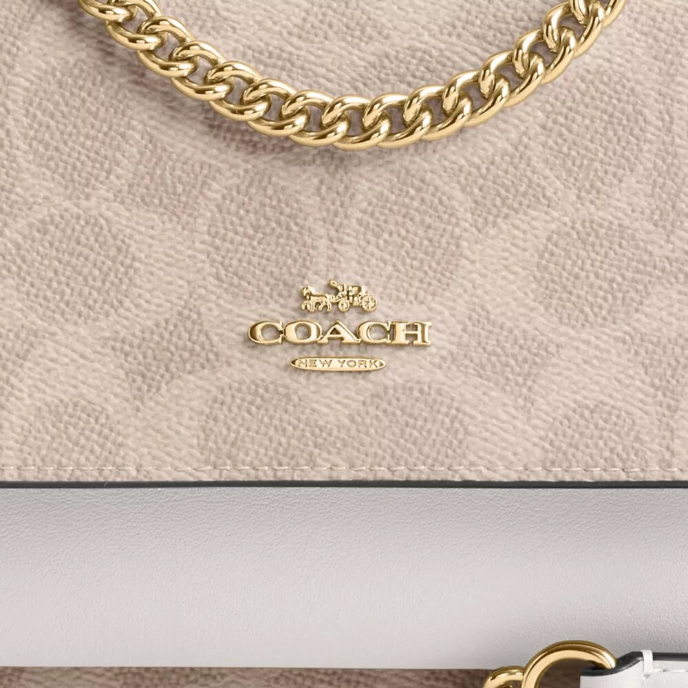 Mini Klare crossbody-tasker i Signature Canvas