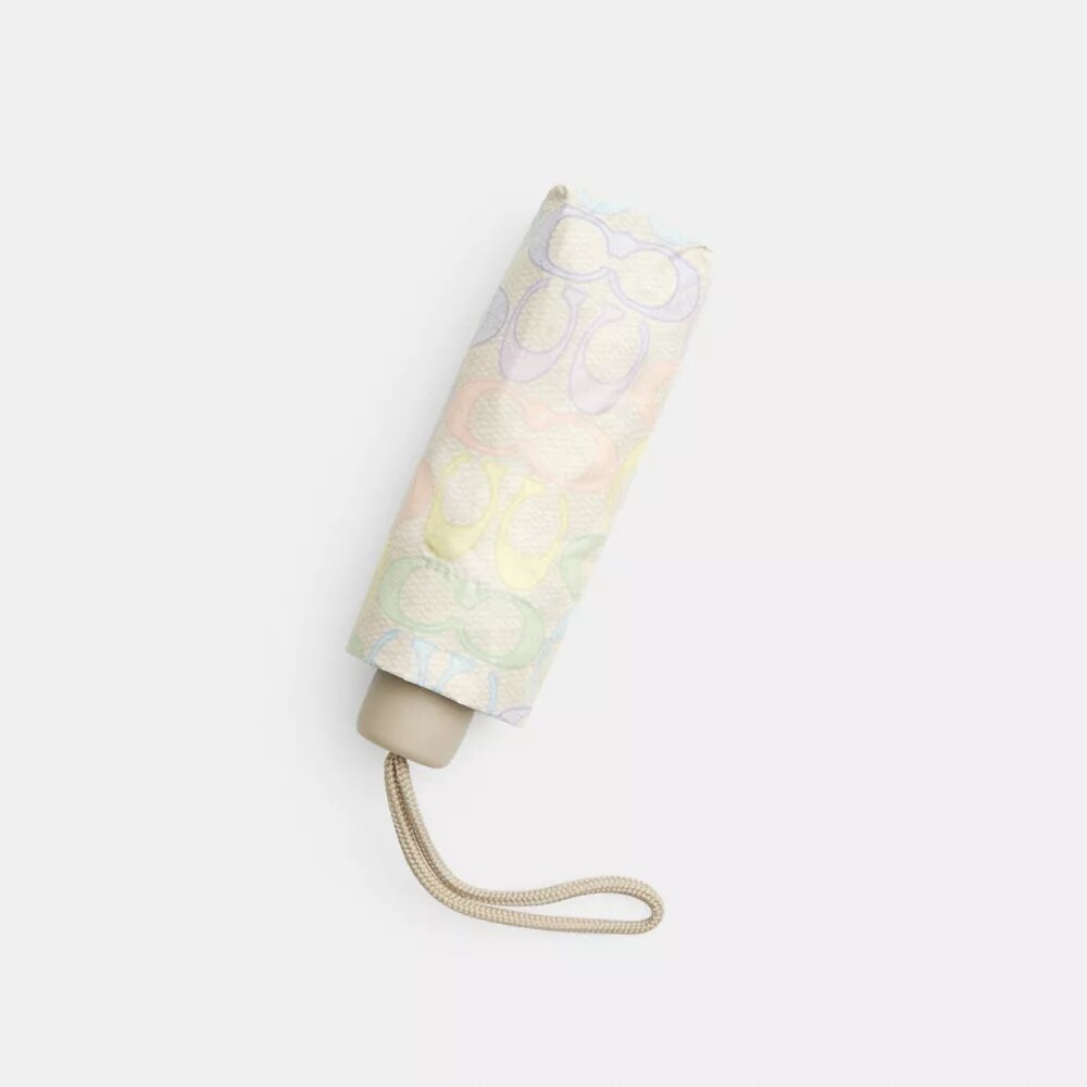 Mini-paraply med UV-beskyttelse i Rainbow Signature-print