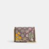 Mini-punge på kæde i signatur-jacquard med blomsterbroderi