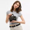 Mini Rowan Crossbody-taske i "Loved" Signature Canvas med Vedhæng