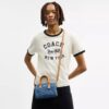 Mini Rowan crossbody-taske i signaturdenim