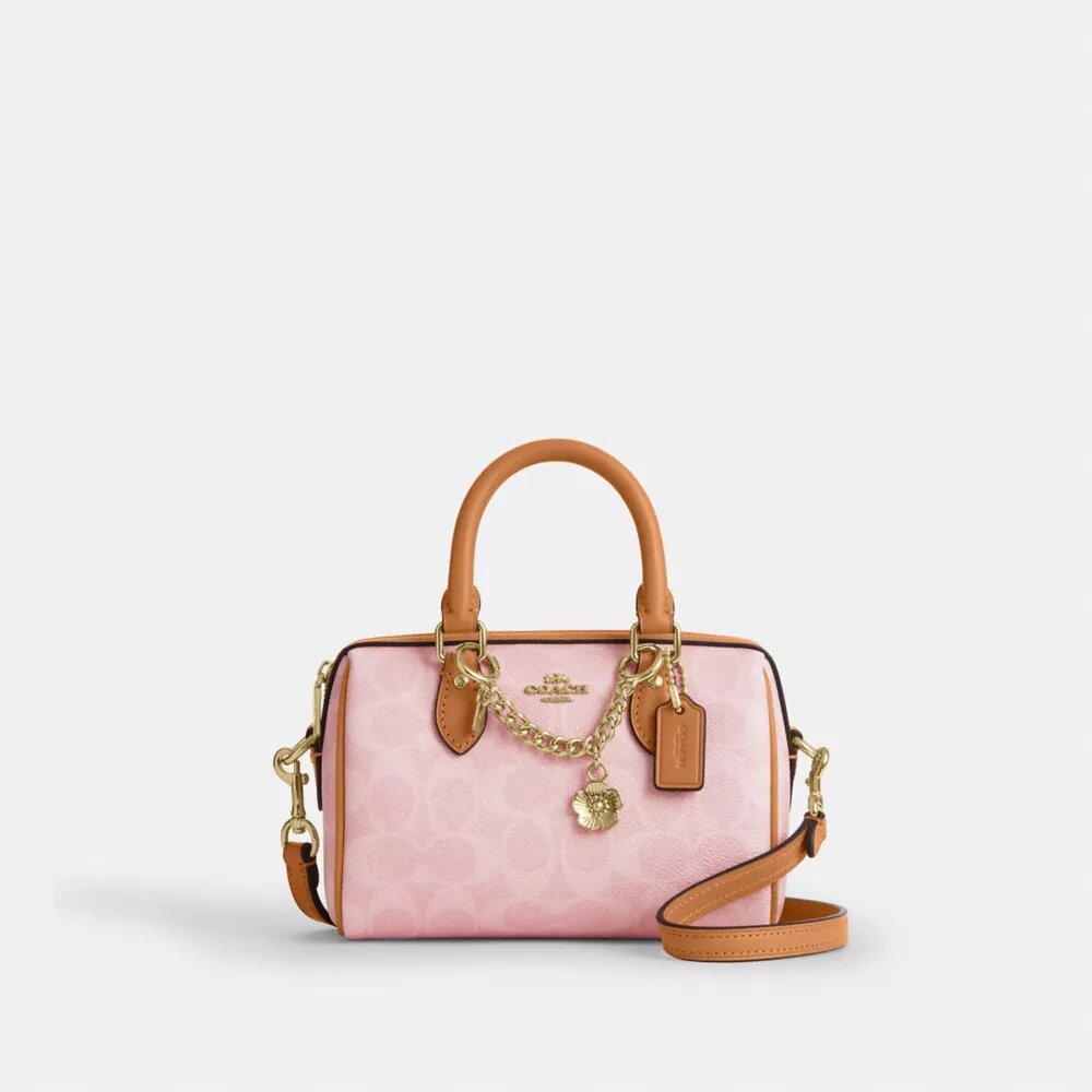 Mini Rowan crossbody-taske i Signature Canvas med Vedhæng