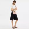 Mini Rowan crossbody-taske i Signature Canvas med Vedhæng