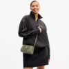Mini Rowan crossbody-taske i signaturlæder