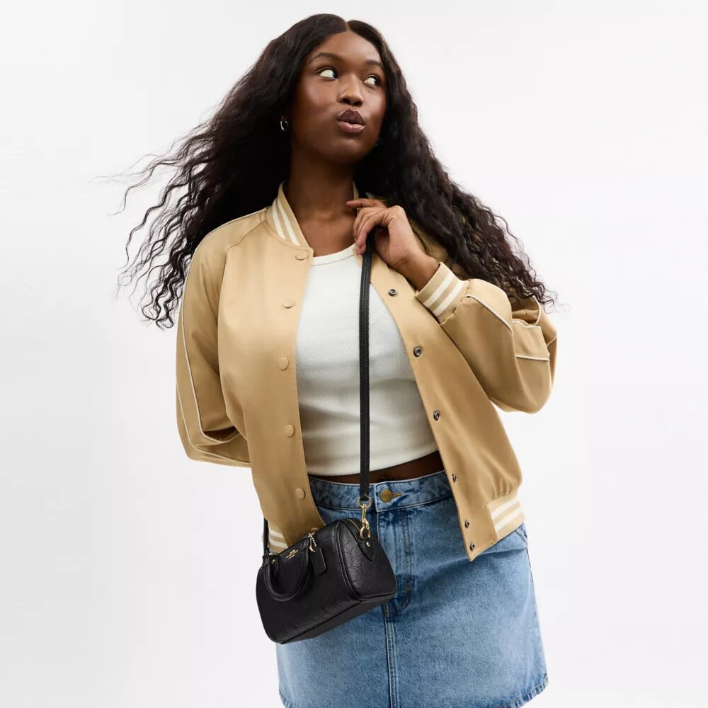 Mini Rowan crossbody-taske i signaturlæder