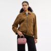 Mini Rowan crossbody-taske i signaturlæder