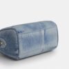Mini Rowan crossbody-taske i slidt denim med vedhæng