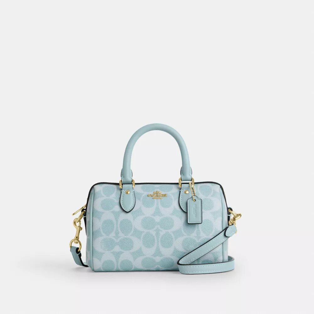 Mini Rowan crossbody-tasker i Signature Canvas