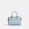 Mini Rowan crossbody-tasker i Signature Canvas