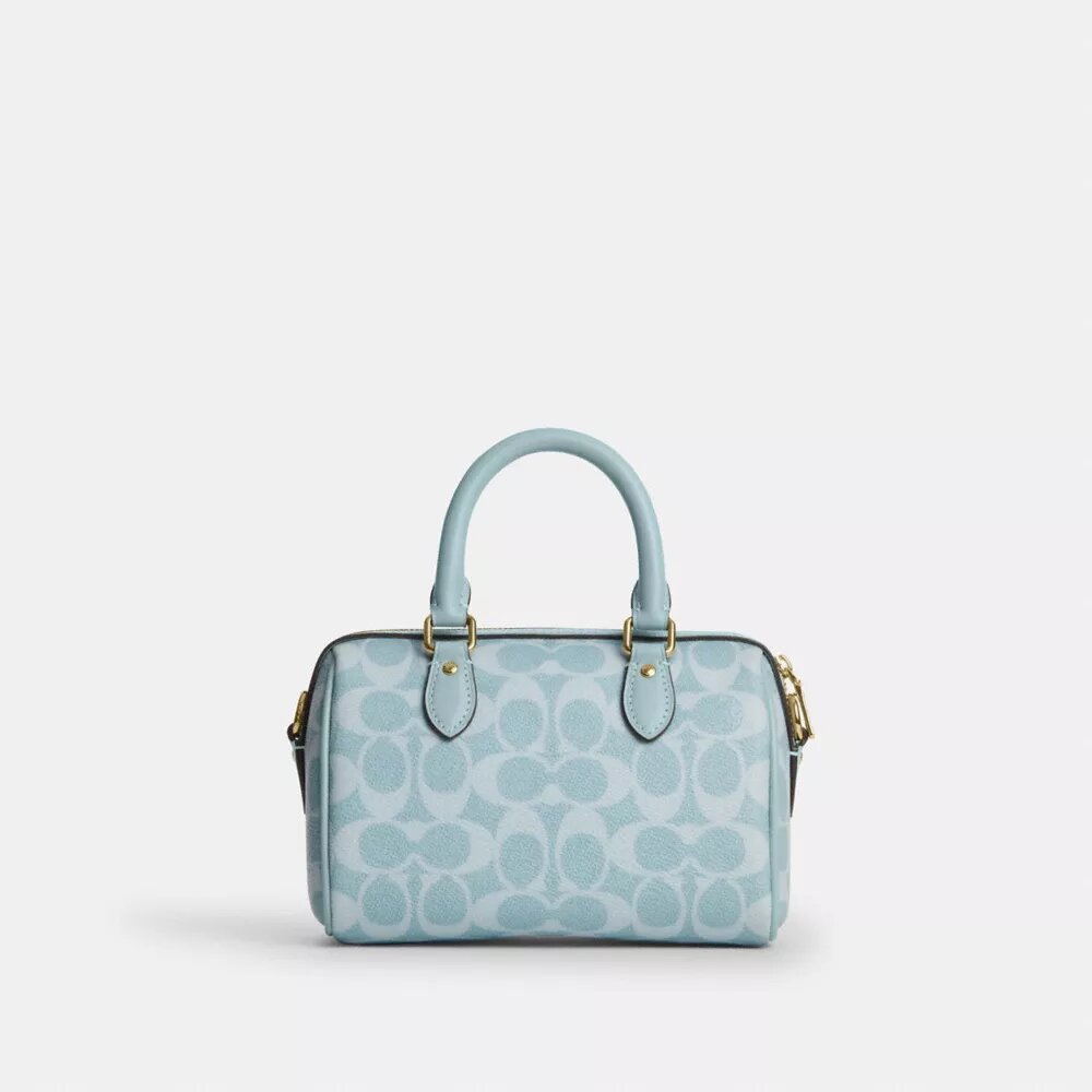 Mini Rowan crossbody-tasker i Signature Canvas