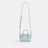 Mini Rowan crossbody-tasker i Signature Canvas