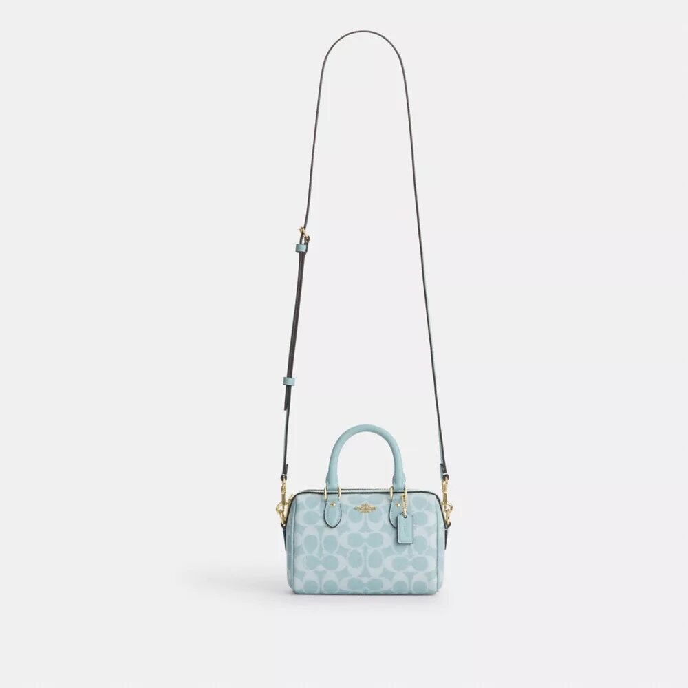 Mini Rowan crossbody-tasker i Signature Canvas
