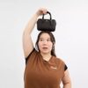 Mini Rowan crossbody-tasker i Signature Canvas