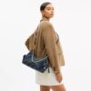 Pocket Juliet-taske 30 i regenerativ bomuldsdenim med quiltning