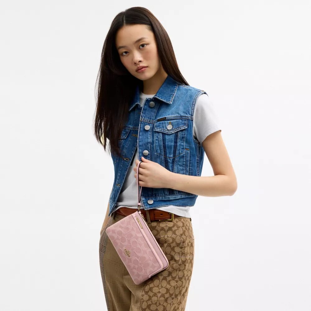 Punge med dobbelt lynlås i Signature Denim
