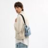Racer Sling Pack i Loved Signature-denim
