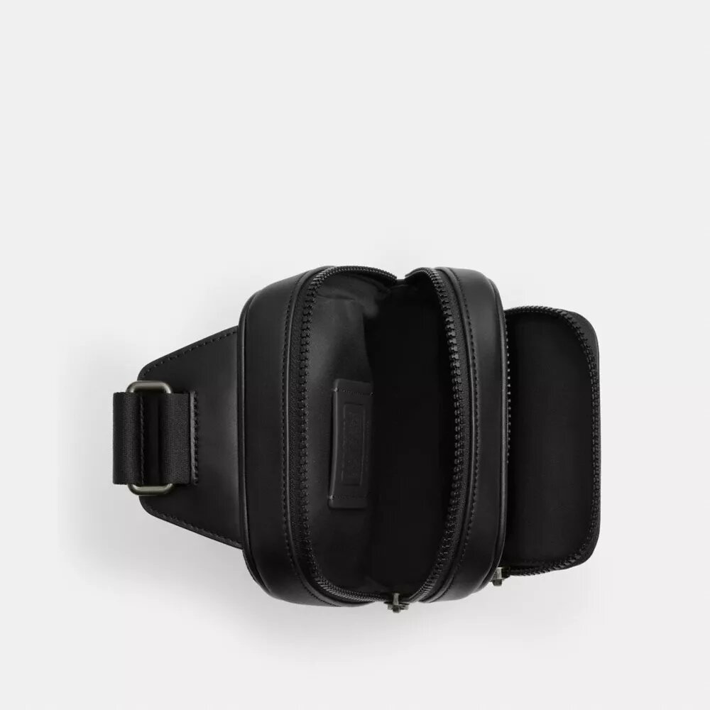 Racer Sling Pack i Signature Canvas