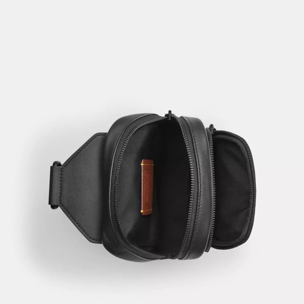 Racer Sling Pack i Signature Canvas