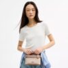 Rainer crossbody-taske 18 i Signature Canvas