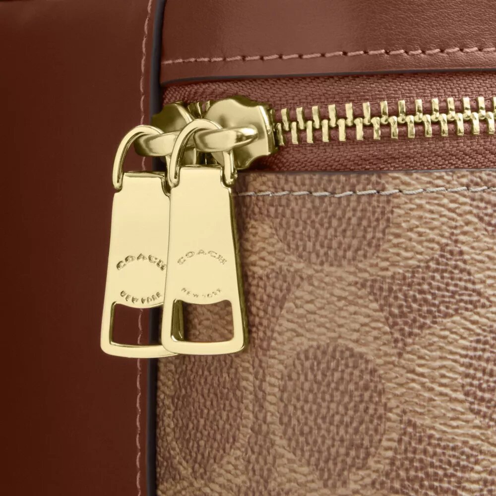 Rainer crossbody-taske 18 i Signature Canvas