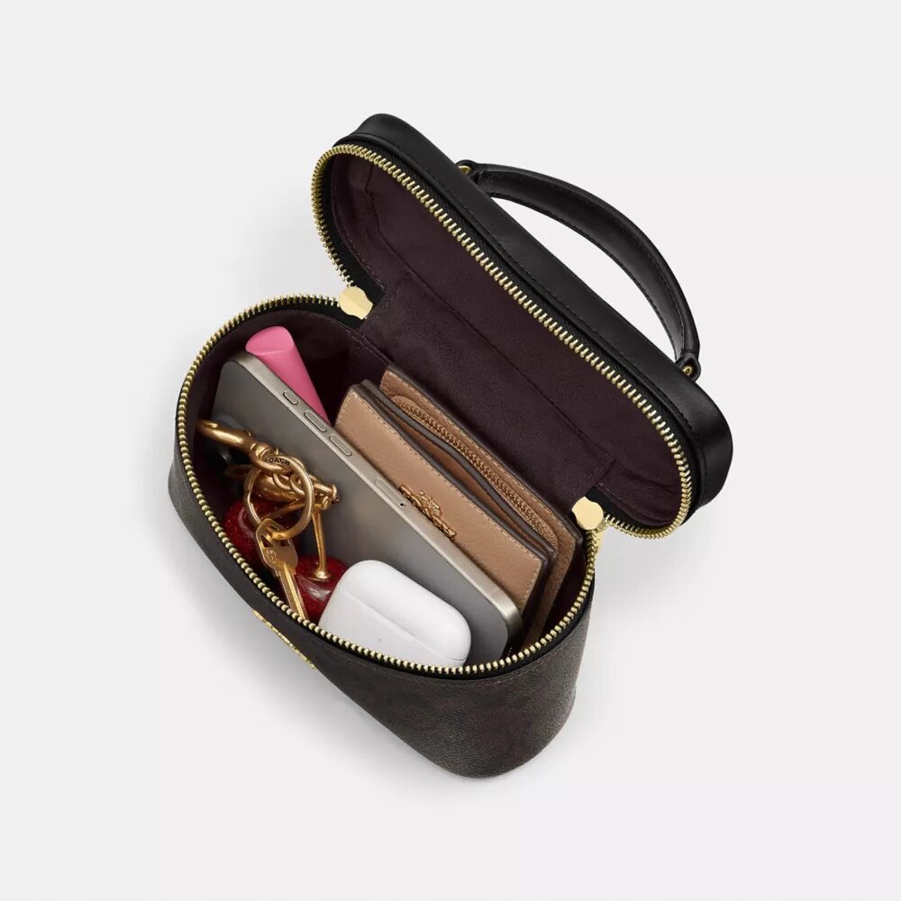 Rainer crossbody-taske 18 i Signature Canvas
