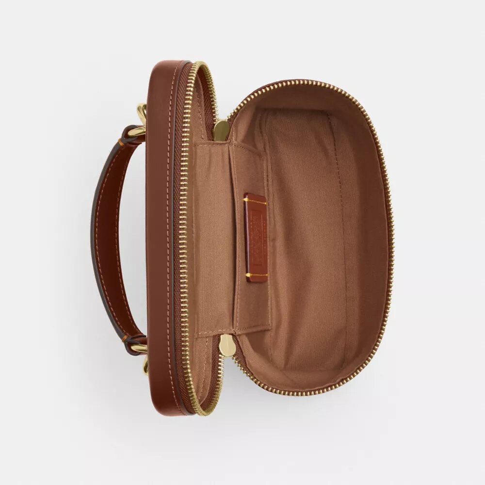 Rainer crossbody-taske 18 i Signature Canvas