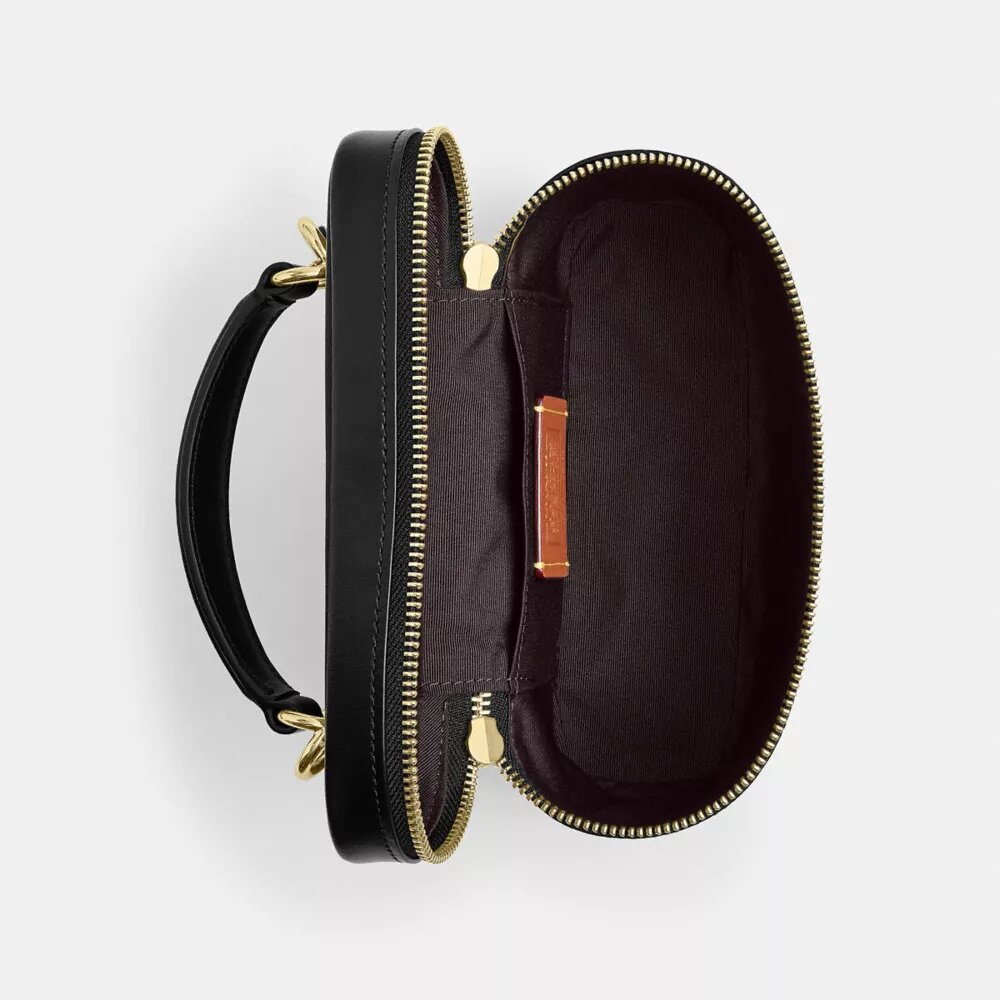 Rainer crossbody-taske 18 i Signature Canvas