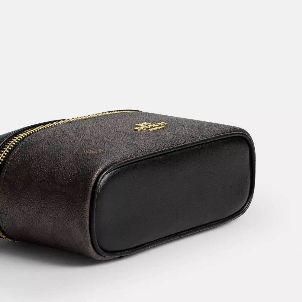 Rainer crossbody-taske 18 i Signature Canvas