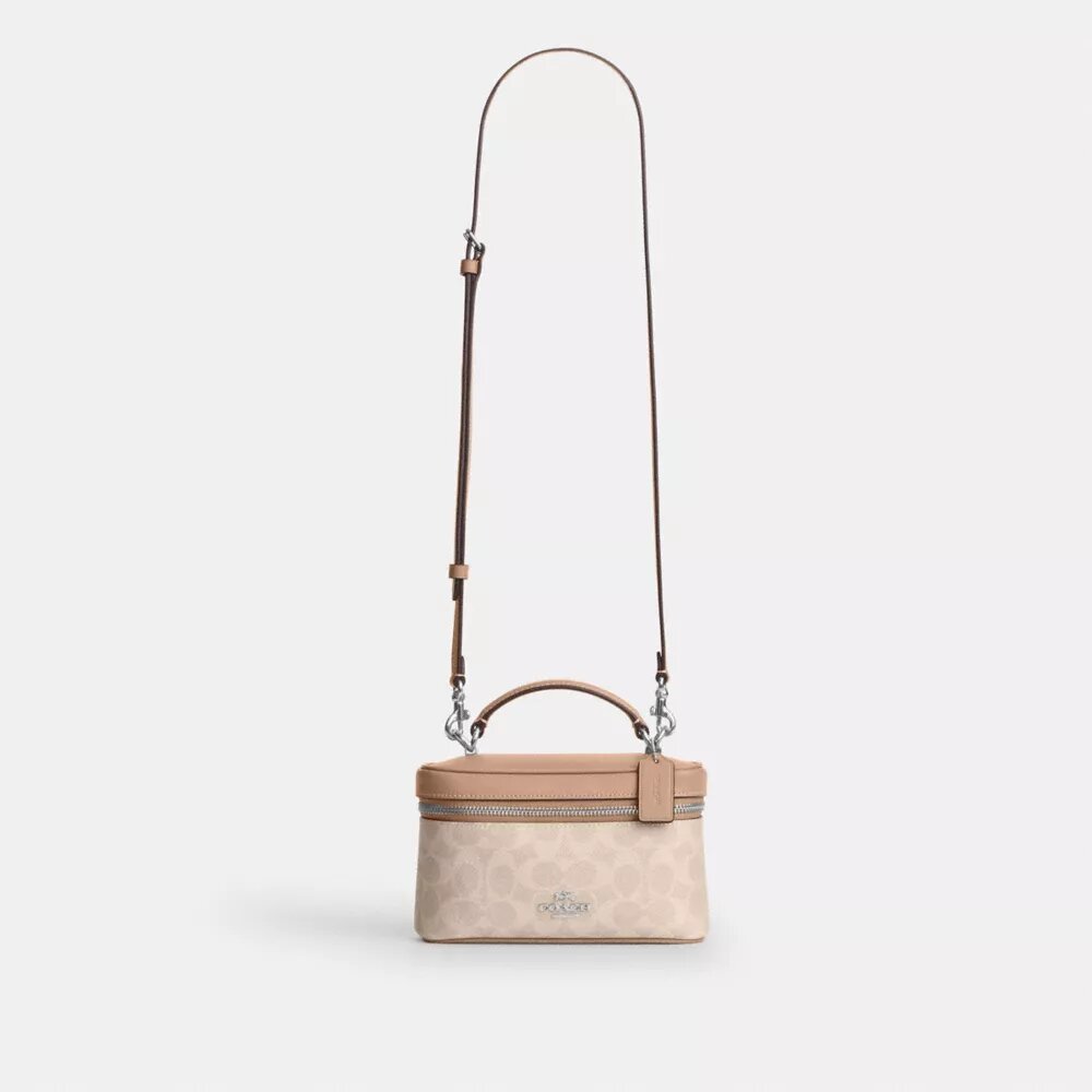 Rainer crossbody-taske 18 i Signature Canvas
