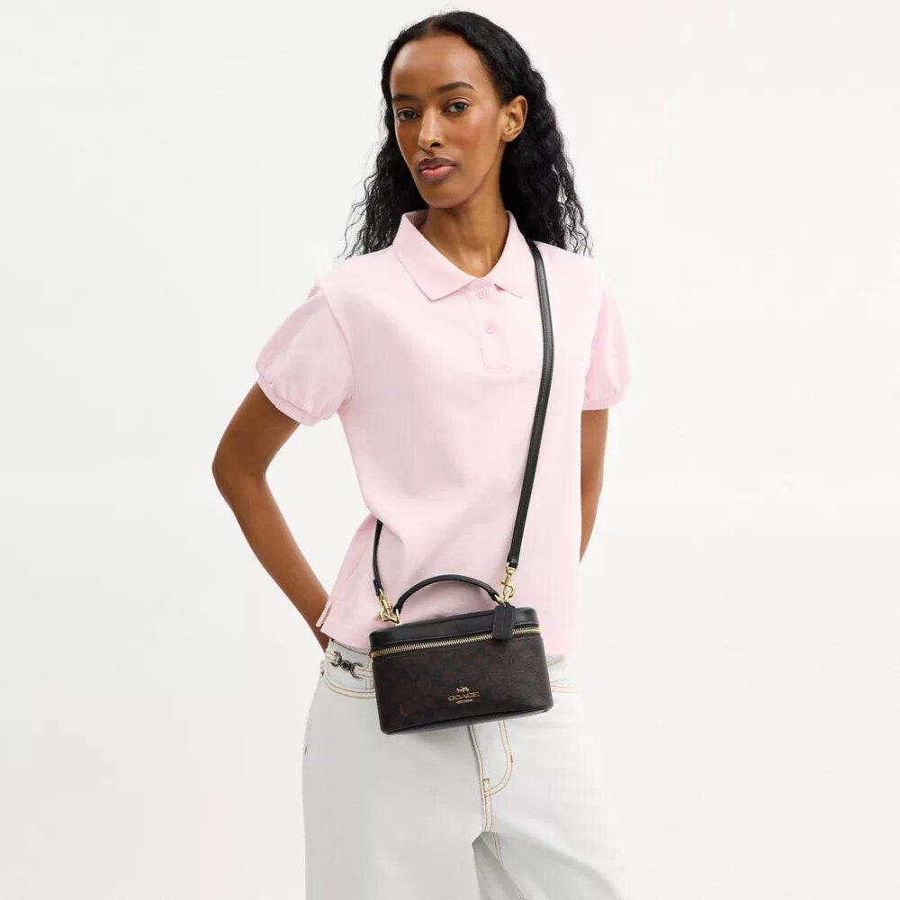 Rainer crossbody-taske 18 i Signature Canvas