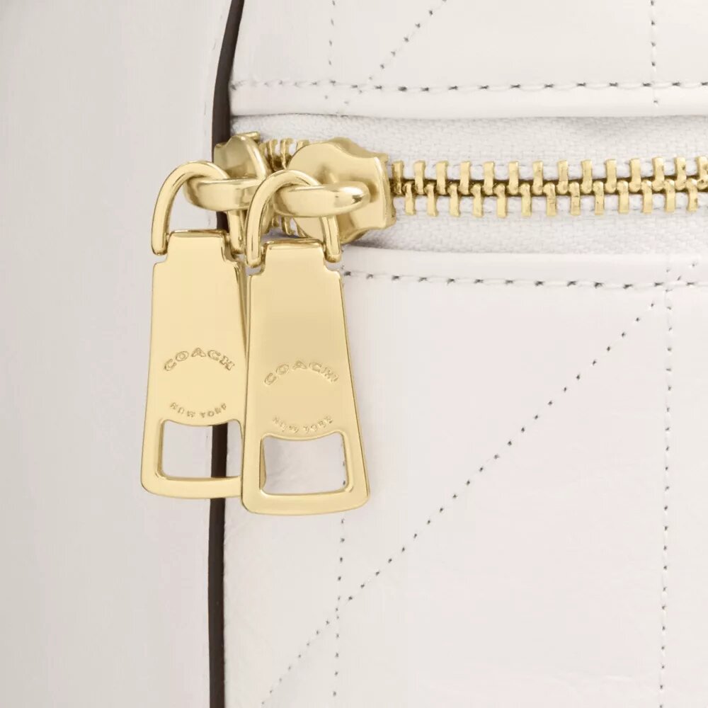 Rainer Crossbody-taske 18 med quiltning