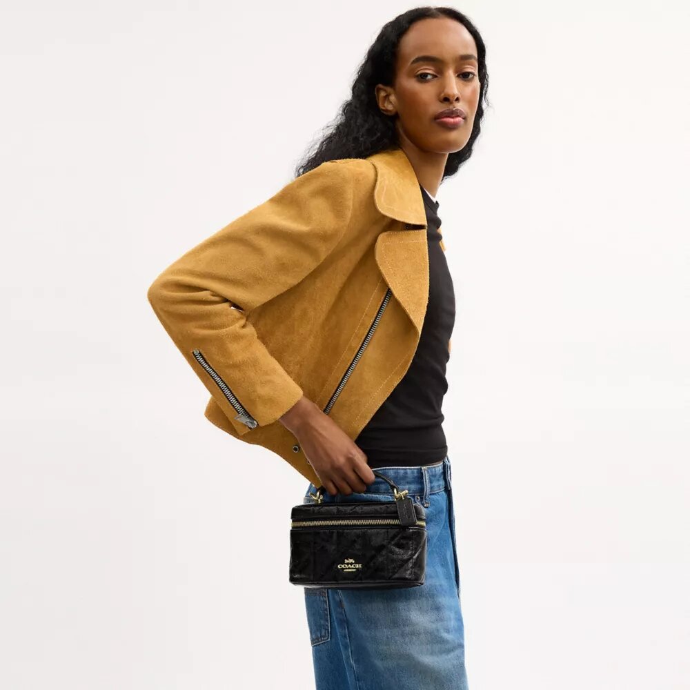Rainer Crossbody-taske 18 med quiltning