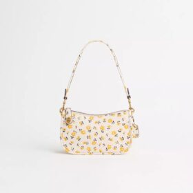 Restaureret Swinger-task 20 med blomsterprint