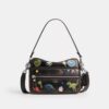 Rexy 10-års fødselsdag Dakota crossbody-taske i patineret læder med klistermærketryk