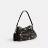Rexy 10-års fødselsdag Dakota crossbody-taske i patineret læder med klistermærketryk
