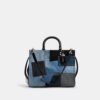 Rogue-tasker med patchwork af genbrugt denim