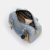 Rowan-satcheltaske i Loved Denim med vedhæng