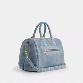 Rowan stor skuldertaske i slidt denim med Vedhæng