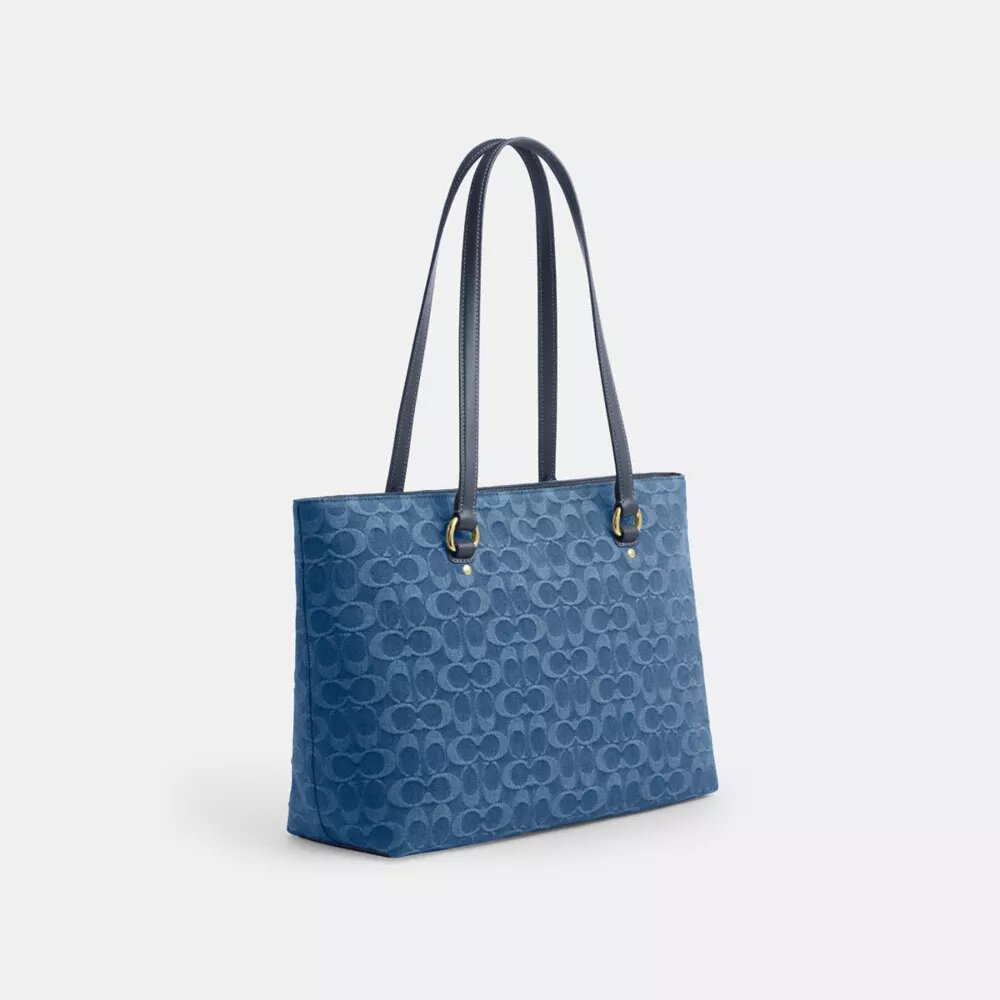 Station Tote-tasker i signaturdenim