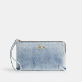 Stor håndledstaske med lynlås i hjørnet i Loved Denim