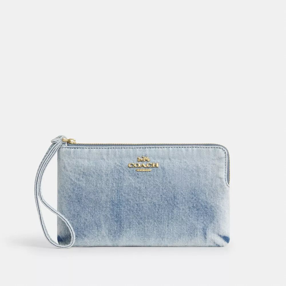 Stor håndledstaske med lynlås i hjørnet i Loved Denim