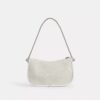 Swinger-tasker i signatur-jacquard