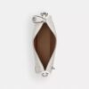 Swinger-tasker i signatur-jacquard